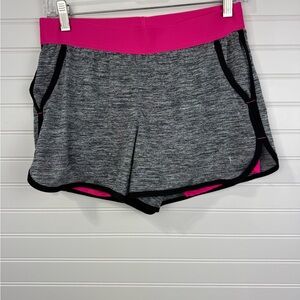 Danskin women’s gray, black, pink lined workout gym shorts. Size 4/6